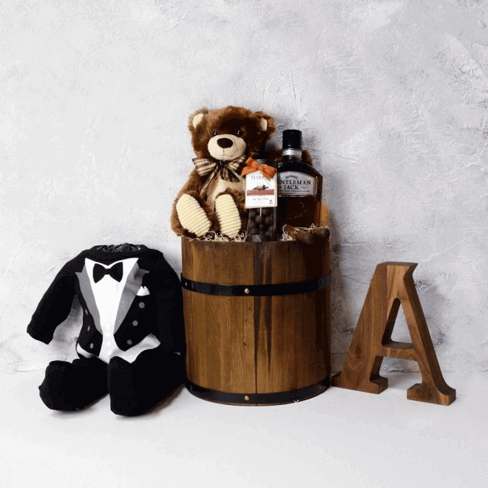 Wooden Barrel Whiskey Gift Basket with Marich Caramels and Baby Tux Footsie – how the gift is presented