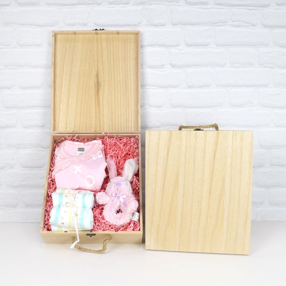 Baby Girl Welcome Gift Basket with Cotton Clothing and Rattle – how the gift is presented