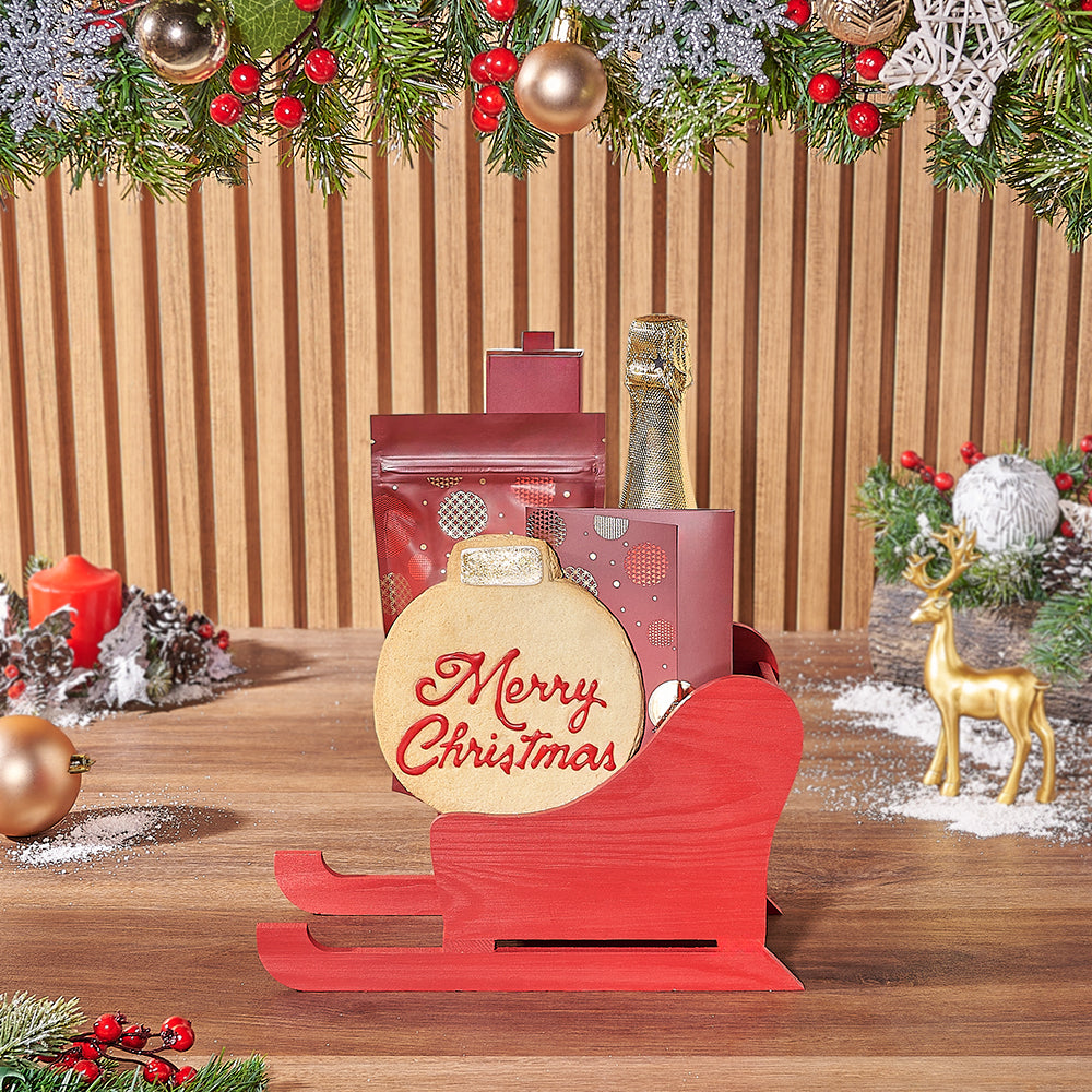 Red Wooden Sled Basket with Sparkling Wine and Christmas Treats – how the gift is presented